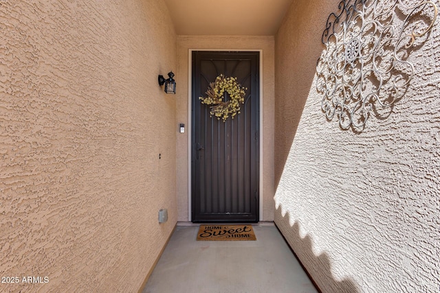 9952 W Jessie Ln, Peoria, AZ 85383 - view of exterior entry featuring stucco siding