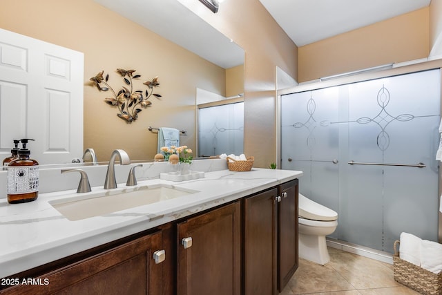 9952 W Jessie Ln, Peoria, AZ 85383 - bathroom featuring vanity, toilet, an enclosed shower, and tile patterned floors
