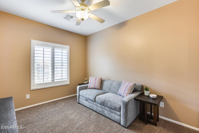9952 W Jessie Ln, Peoria, AZ 85383 - sitting room featuring carpet flooring, baseboards, and a ceiling fan