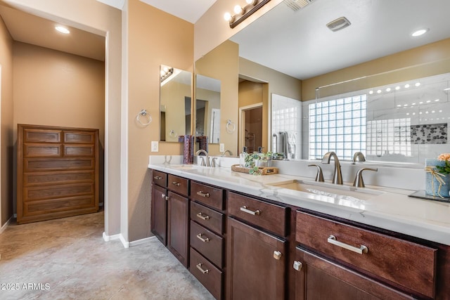 9952 W Jessie Ln, Peoria, AZ 85383 - full bath featuring double vanity and baseboards