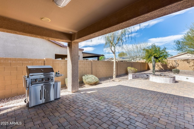 9952 W Jessie Ln, Peoria, AZ 85383 - fenced backyard featuring a patio area and a grill