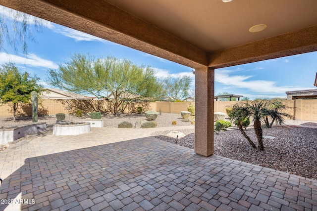 9952 W Jessie Ln, Peoria, AZ 85383 - fenced backyard featuring a patio area