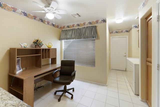 office featuring ceiling fan and light tile patterned floors