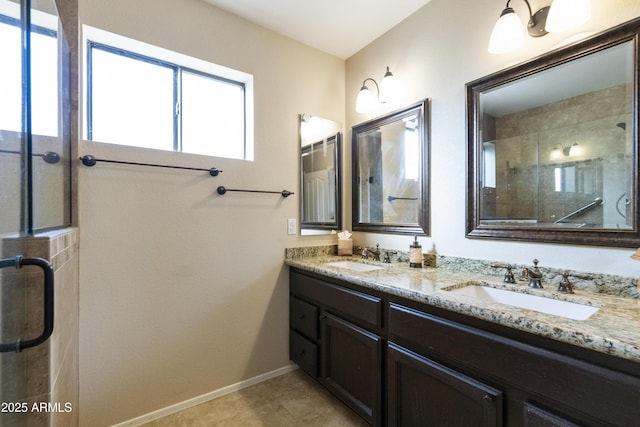 bathroom featuring vanity, tile patterned floors, and walk in shower