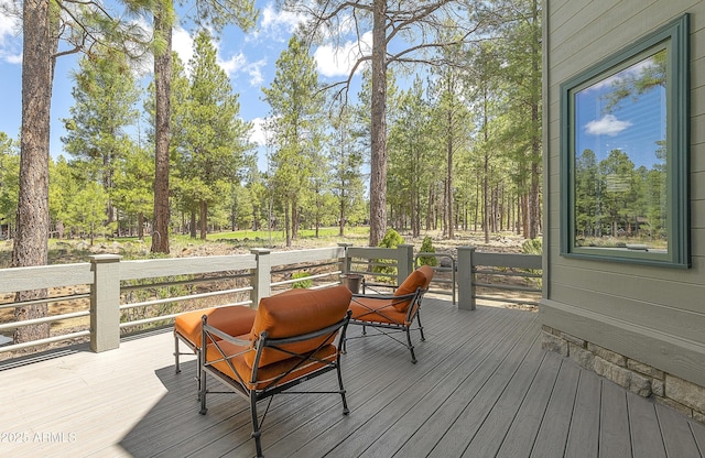 2036 Bessie Kidd Best, Flagstaff, AZ 86005 - wooden deck with view of scattered trees