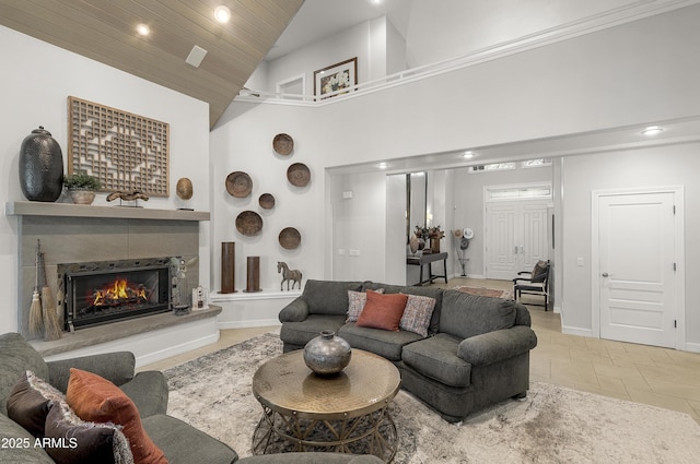 2036 Bessie Kidd Best, Flagstaff, AZ 86005 - living area with recessed lighting, high vaulted ceiling, a lit fireplace, wood ceiling, and baseboards
