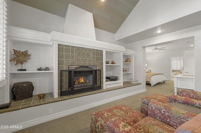 2036 Bessie Kidd Best, Flagstaff, AZ 86005 - living room with vaulted ceiling, carpet floors, a fireplace, ceiling fan, and recessed lighting