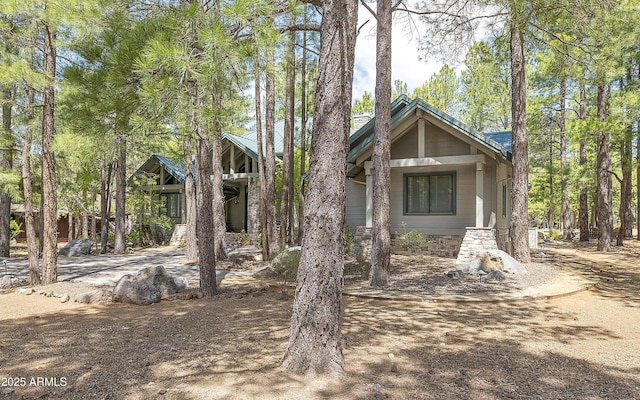 2036 Bessie Kidd Best, Flagstaff, AZ 86005 - view of front of house featuring dirt driveway