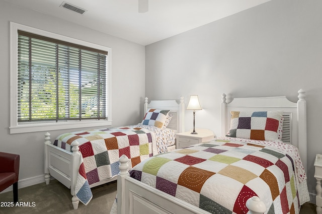 2036 Bessie Kidd Best, Flagstaff, AZ 86005 - carpeted bedroom featuring a ceiling fan and baseboards