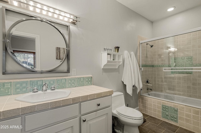 2036 Bessie Kidd Best, Flagstaff, AZ 86005 - bathroom with toilet, tile patterned floors, tiled shower / bath combo, vanity, and recessed lighting