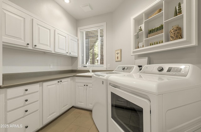 2036 Bessie Kidd Best, Flagstaff, AZ 86005 - laundry room featuring separate washer and dryer, cabinet space, recessed lighting, and light tile patterned floors