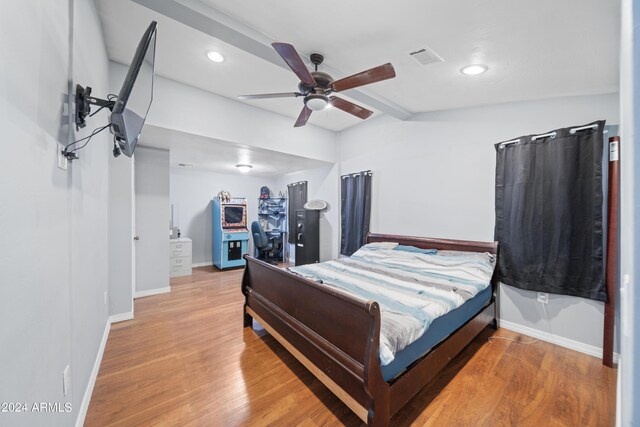 living room with carpet flooring, ceiling fan, and a textured ceiling