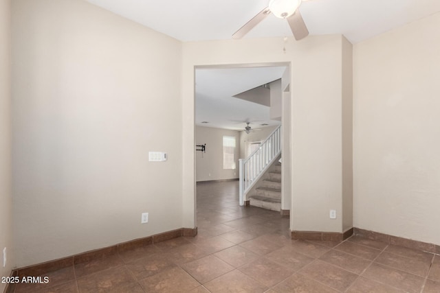 1968 E Emily Ln, Gilbert, AZ 85295 - tiled empty room with baseboards, ceiling fan, and stairs