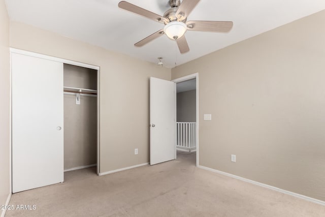 1968 E Emily Ln, Gilbert, AZ 85295 - unfurnished bedroom featuring baseboards, light carpet, ceiling fan, and a closet