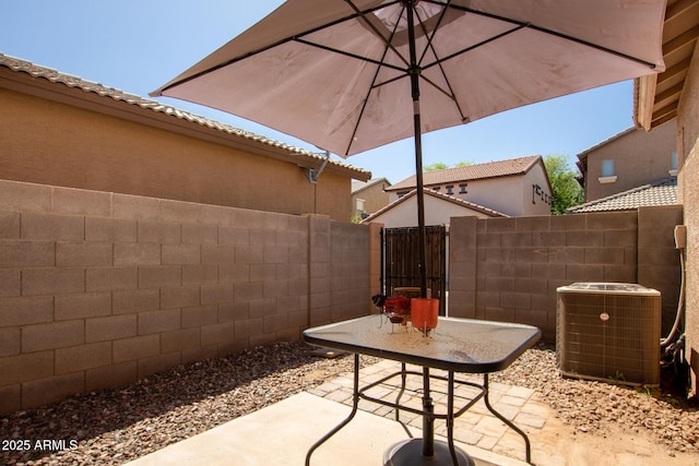 1968 E Emily Ln, Gilbert, AZ 85295 - view of patio featuring fence and central AC