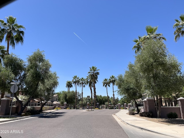 1968 E Emily Ln, Gilbert, AZ 85295 - view of road featuring traffic signs, a residential view, sidewalks, and curbs