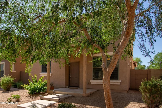 1968 E Emily Ln, Gilbert, AZ 85295 - view of front of home with stucco siding and fence