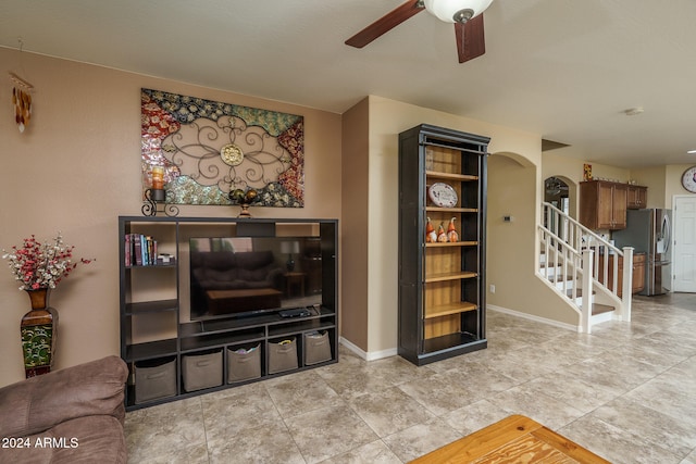 living room featuring ceiling fan