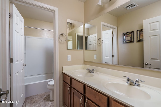 full bathroom featuring tile patterned flooring, vanity, toilet, and tub / shower combination