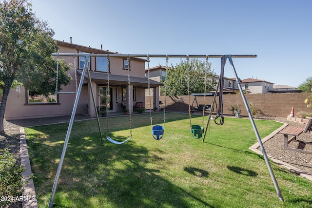 view of play area featuring a lawn