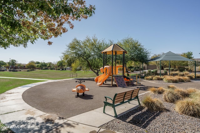 view of playground featuring a yard