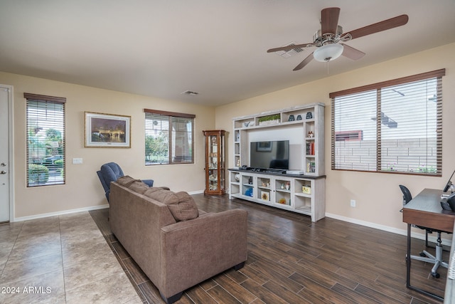 living room featuring hardwood / wood-style floors, a wealth of natural light, and ceiling fan