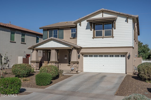 view of front of home with a garage