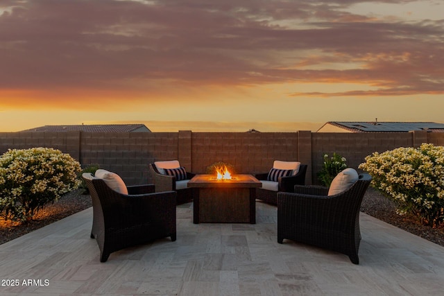17896 W Amberwood Dr, Goodyear, AZ 85338 - view of patio / terrace featuring a fenced backyard and a fire pit