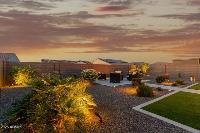17896 W Amberwood Dr, Goodyear, AZ 85338 - view of yard featuring a patio area and a fenced backyard