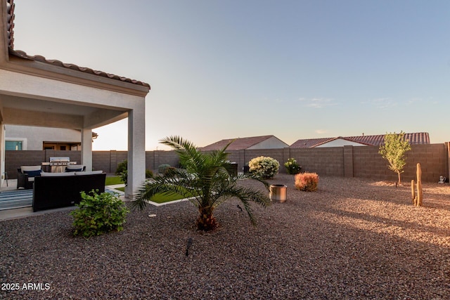 17896 W Amberwood Dr, Goodyear, AZ 85338 - view of yard featuring a fenced backyard, a patio area, and an outdoor hangout area