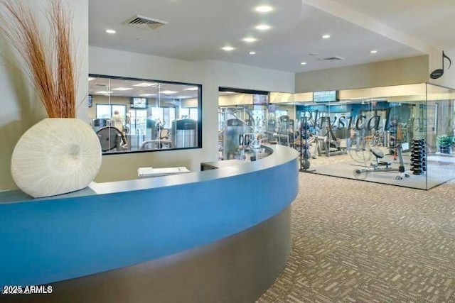 17896 W Amberwood Dr, Goodyear, AZ 85338 - exercise room featuring visible vents, recessed lighting, and carpet