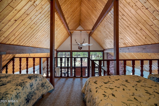 unfurnished bedroom with expansive windows, carpet floors, vaulted ceiling with beams, and wooden ceiling