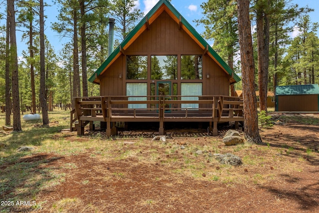 back of property with a deck