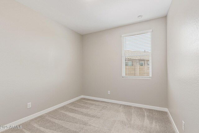 4371 E Enmark Dr, San Tan Valley, AZ 85143 - spare room featuring light carpet and a smoke detector