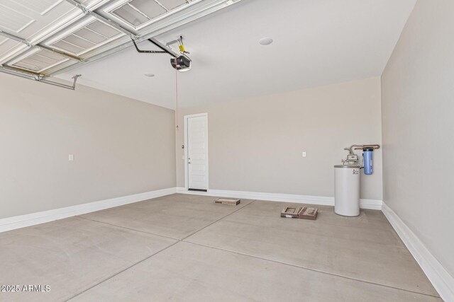 4371 E Enmark Dr, San Tan Valley, AZ 85143 - garage featuring a garage door opener and baseboards