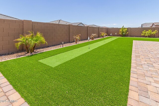4371 E Enmark Dr, San Tan Valley, AZ 85143 - fenced backyard with an area to practice putting