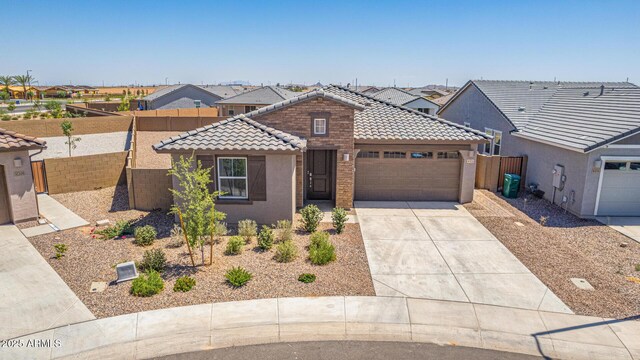 4371 E Enmark Dr, San Tan Valley, AZ 85143 - view of front of home featuring an attached garage, a tile roof, concrete driveway, and stucco siding