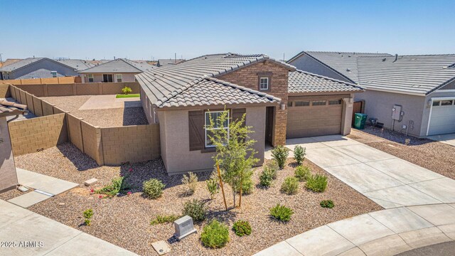 4371 E Enmark Dr, San Tan Valley, AZ 85143 - view of front facade with a tile roof, concrete driveway, a garage, and stucco siding
