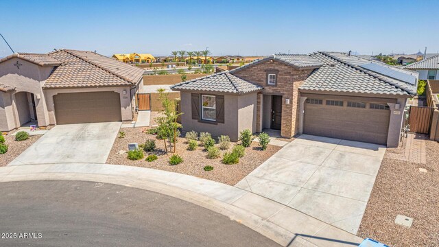 4371 E Enmark Dr, San Tan Valley, AZ 85143 - view of front of property featuring driveway, an attached garage, and a tile roof