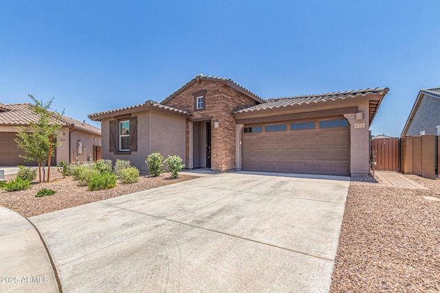 4371 E Enmark Dr, San Tan Valley, AZ 85143 - view of front facade with a tile roof, an attached garage, driveway, and a gate
