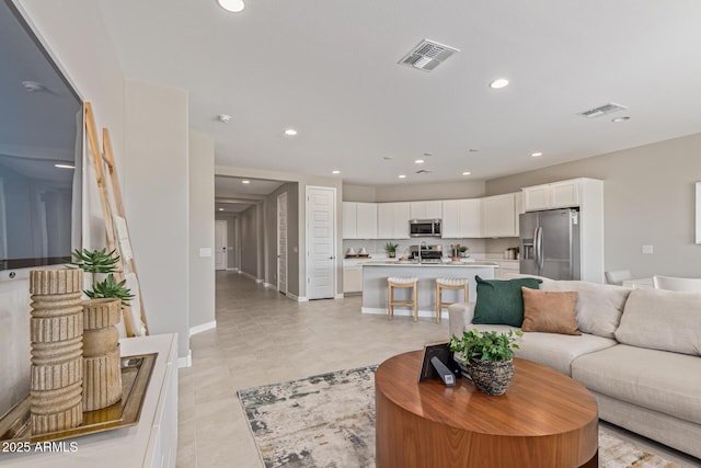 4371 E Enmark Dr, San Tan Valley, AZ 85143 - living area featuring recessed lighting and light tile patterned floors