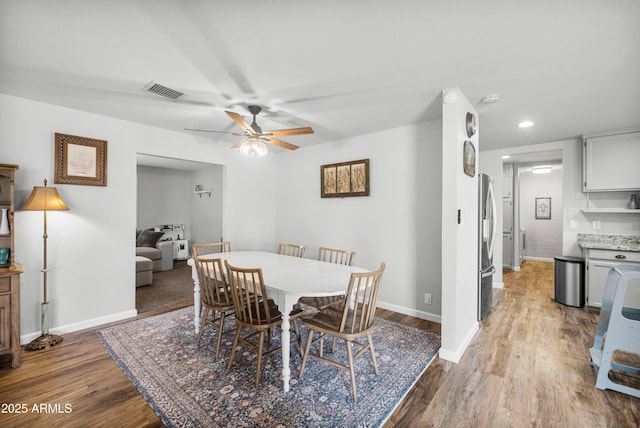 1408 N 62nd Pl, Mesa, AZ 85205 - dining area with wood finished floors, baseboards, a ceiling fan, and recessed lighting