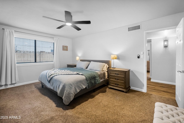 1408 N 62nd Pl, Mesa, AZ 85205 - bedroom with carpet flooring, baseboards, and a ceiling fan