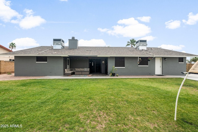 1408 N 62nd Pl, Mesa, AZ 85205 - rear view of house featuring a patio, a chimney, an outdoor hangout area, cooling unit, and a shingled roof