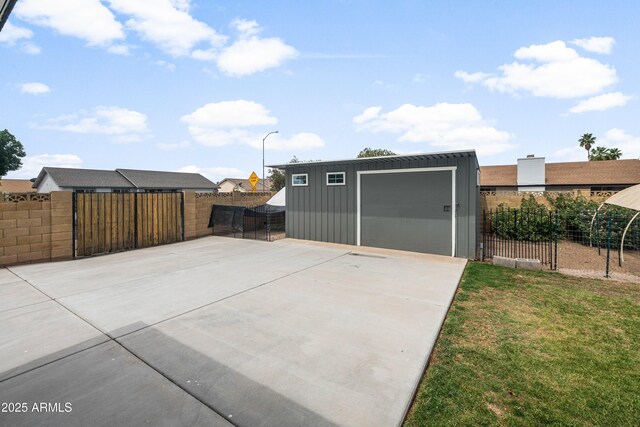 1408 N 62nd Pl, Mesa, AZ 85205 - detached garage with concrete driveway