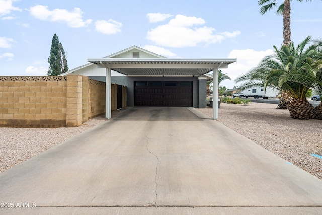 1408 N 62nd Pl, Mesa, AZ 85205 - garage featuring driveway and an attached carport