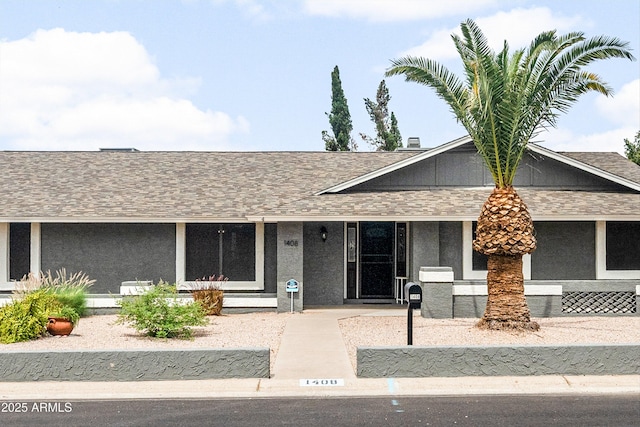 1408 N 62nd Pl, Mesa, AZ 85205 - view of front facade featuring covered porch, roof with shingles, and stucco siding