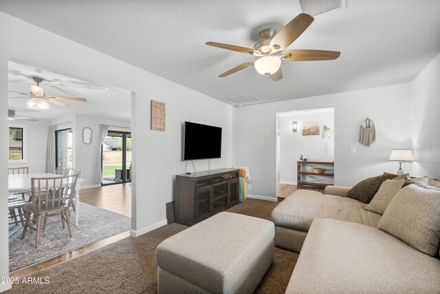 1408 N 62nd Pl, Mesa, AZ 85205 - living room with ceiling fan and baseboards