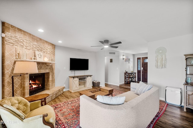 1408 N 62nd Pl, Mesa, AZ 85205 - living room featuring baseboards, a large fireplace, wood finished floors, ceiling fan, and recessed lighting
