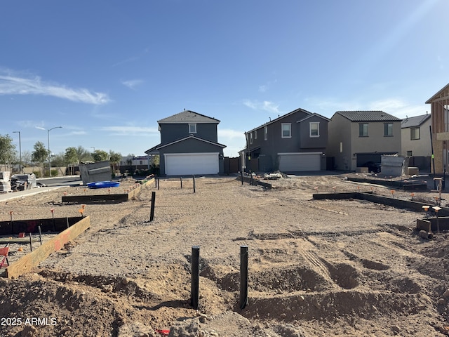 view of yard featuring a garage